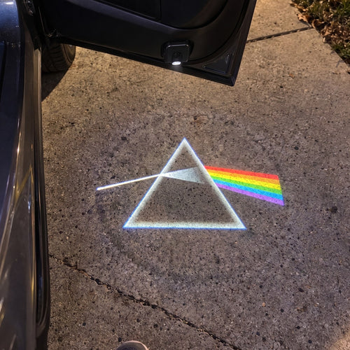 RockFlare Pink Floyd prism projected under the car door